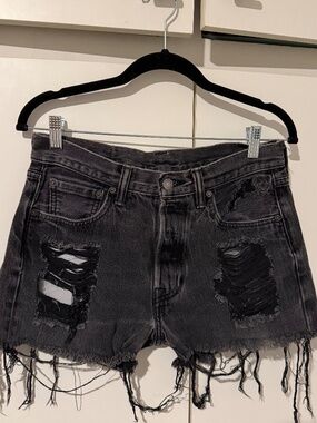 Distressed dark wash Levi shorts